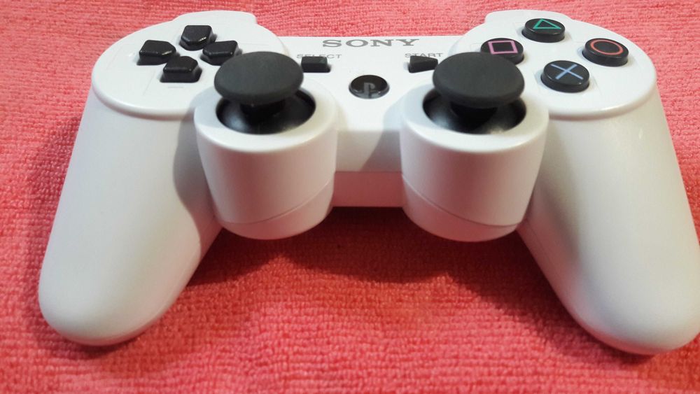 Геймпад Sony Playstation3 (Бiлий у блiтсерi)