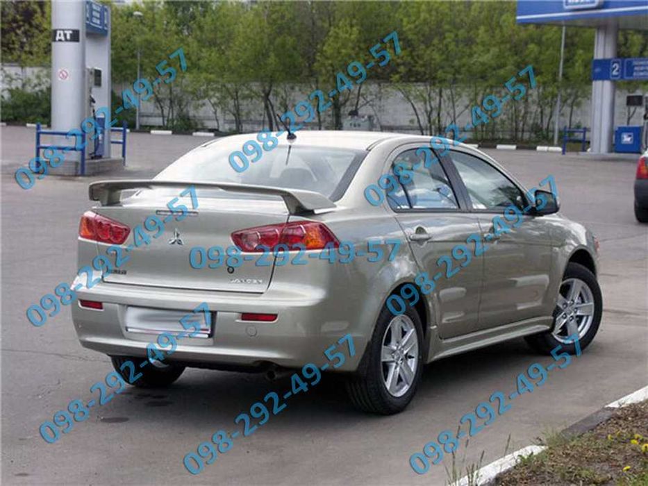 Накладки на пороги спойлер юбки реснички клыки Mitsubishi Lancer 9 10