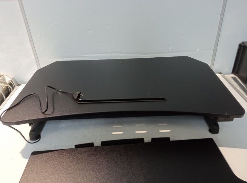 Elevador eléctrico de secretária