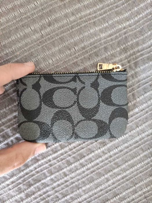 Porta moedas Coach