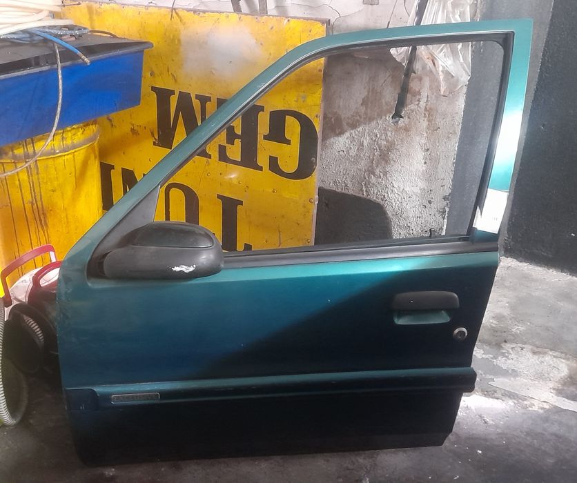 Porta esq. Citroen saxo