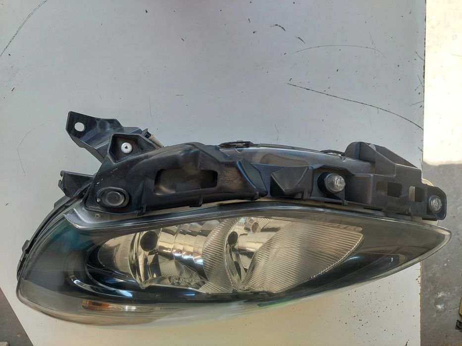 farol esq Renault clio 3