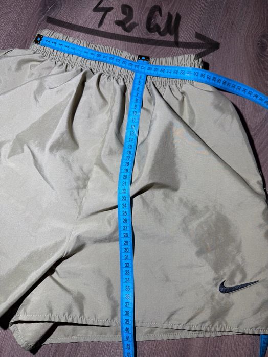Підліткові спортивні шорти Nike кольору хакі для бігу, тренувань
