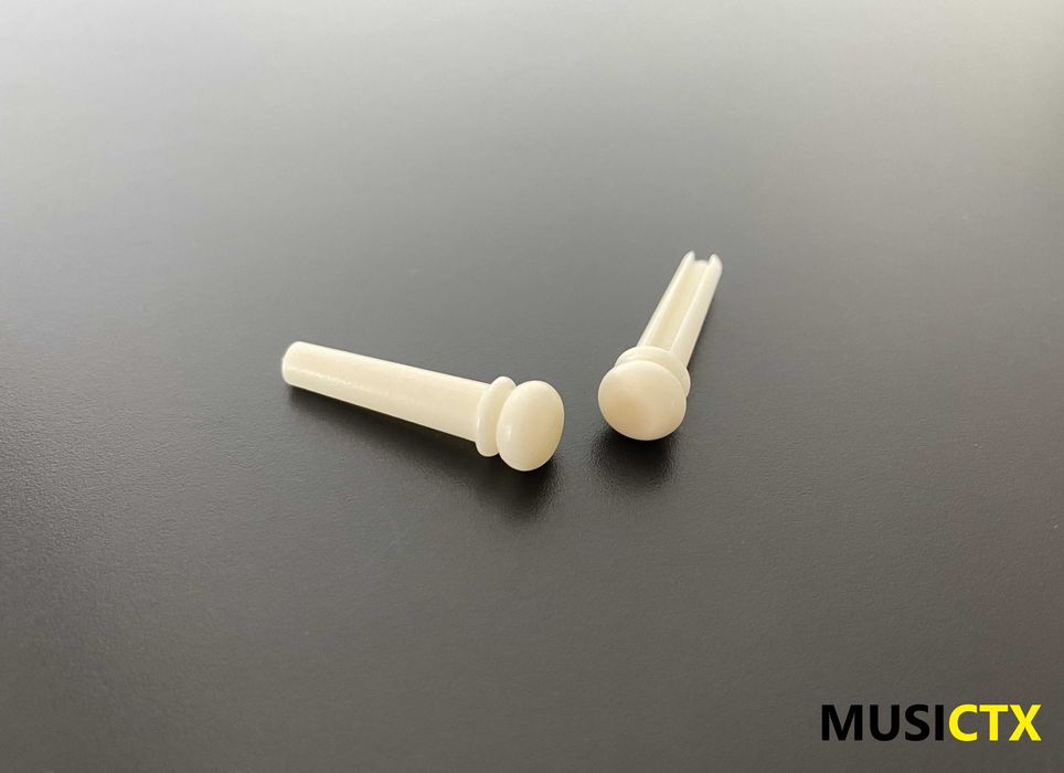 Pins em osso para guitarra folk