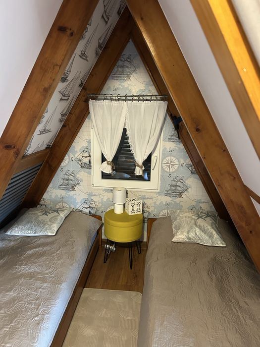 Domek nad jeziorem Warmia i Mazury łódka pomost