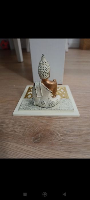 Base de vela com Buda