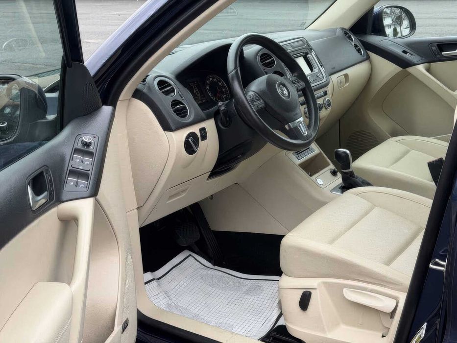 Volkswagen Tiguan 2.0      2014