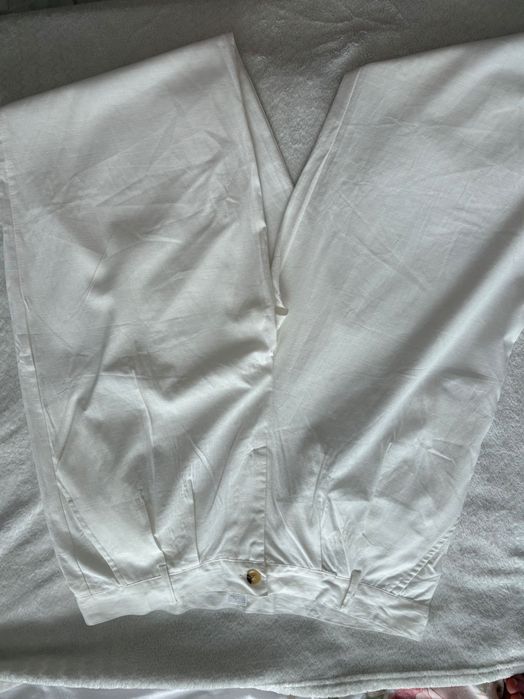 Białe świetne spodnie prosta nogawka L XL 40 len bawełna