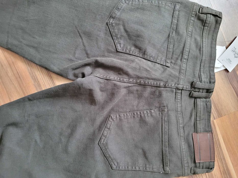 Spodnie męskie nowe 42