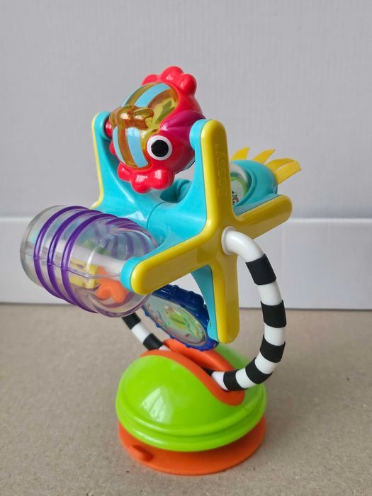 Развивающая игрушка погремушка Sassy sea friend на присоске.