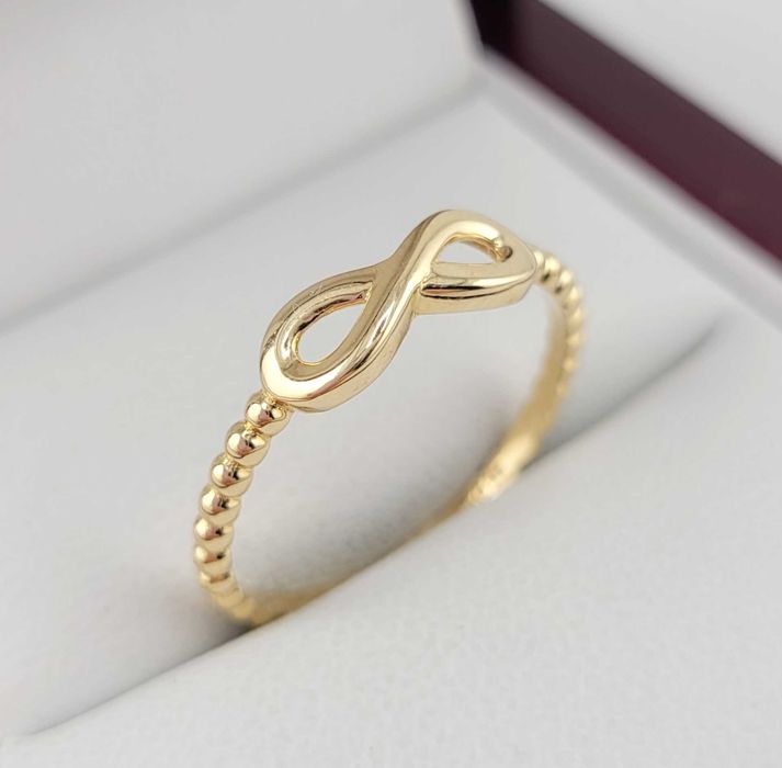 Złoty pierścionek NIESKOŃCZONOŚĆ 1,24g PR.585 14K R.16