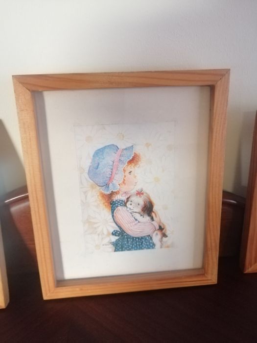 Quadros antigos e borboletas