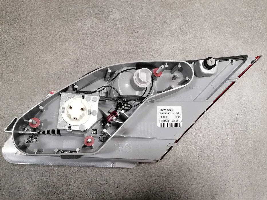 BMW E65 E66 lampa LEWA w pokrywie bagażnika NOWA oryginał