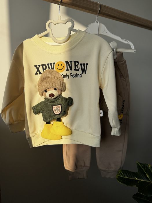 Костюмчик з нашитими шапочками