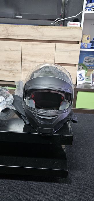 Capacete e luvas e botas de Moto