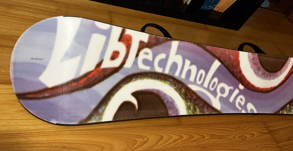 Prancha de snowboard com fixações