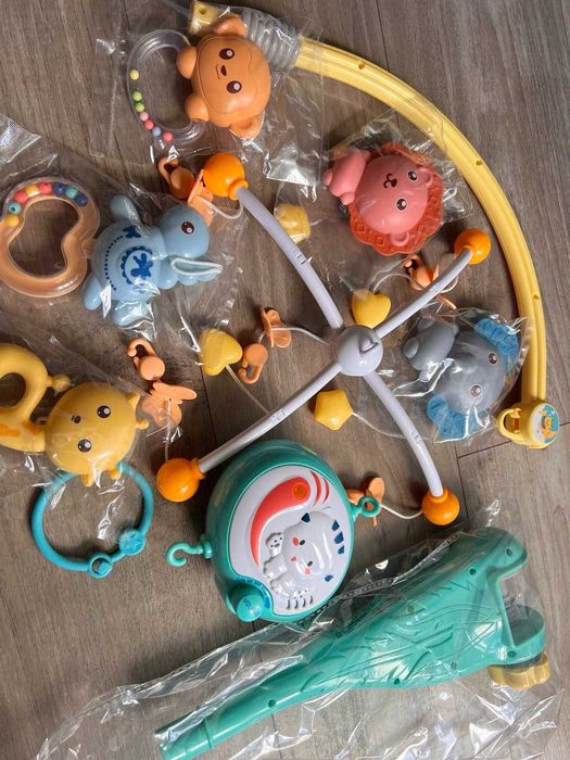 Мобіль музичний у дитяче ліжко