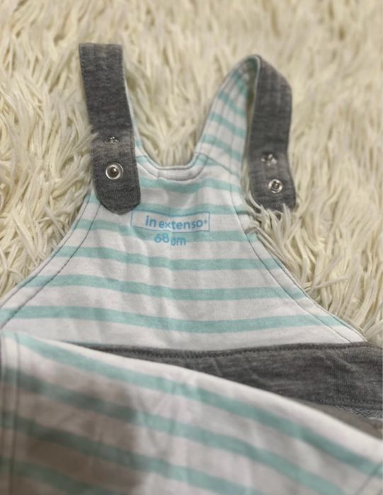 Jardineira bebe menino