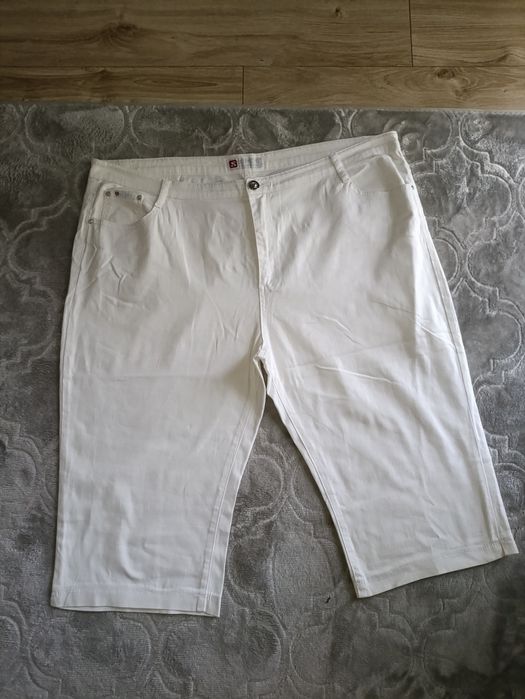 Białe spodnie bawełna 42 jeansy głęboki stan