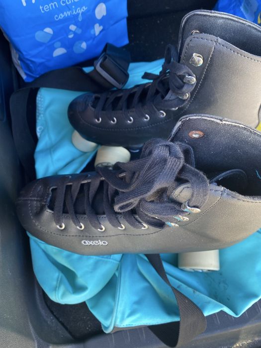 Patins pretos com saco