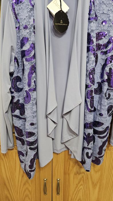 Nowa narzutka z cekinami 48-50 elastyczna