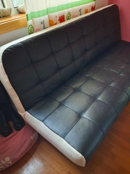 Sofa cama fica como cama casal