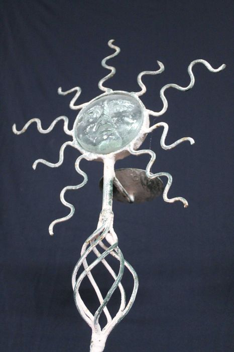 Castiçais em ferro e vidro