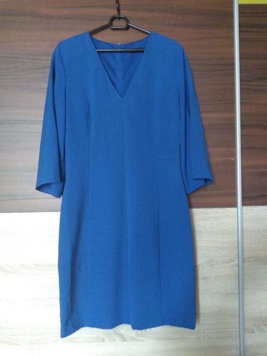 Niebieska sukienka Reserved