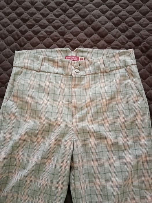 Calça de xadrex de meia estação