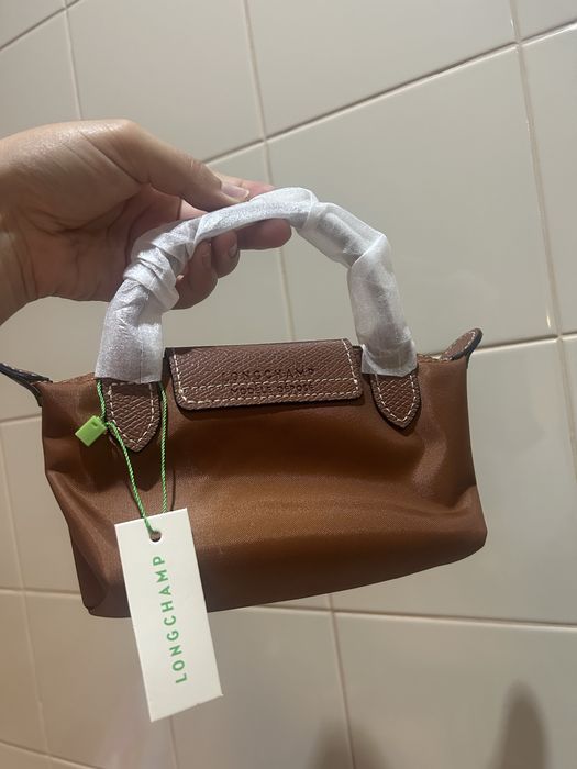 Mala longchamp castanha