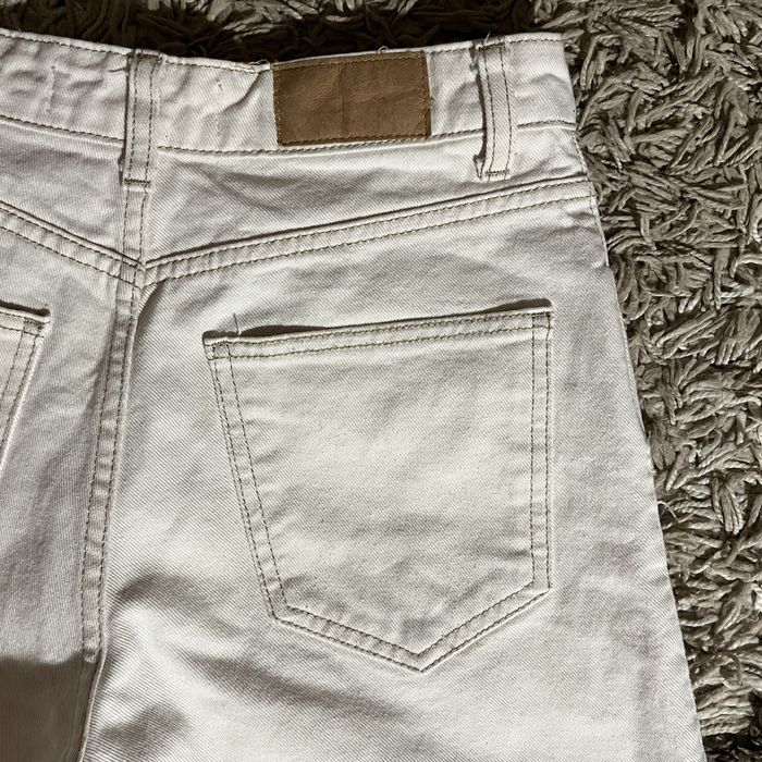 білі кльош джинси з високою посадкою