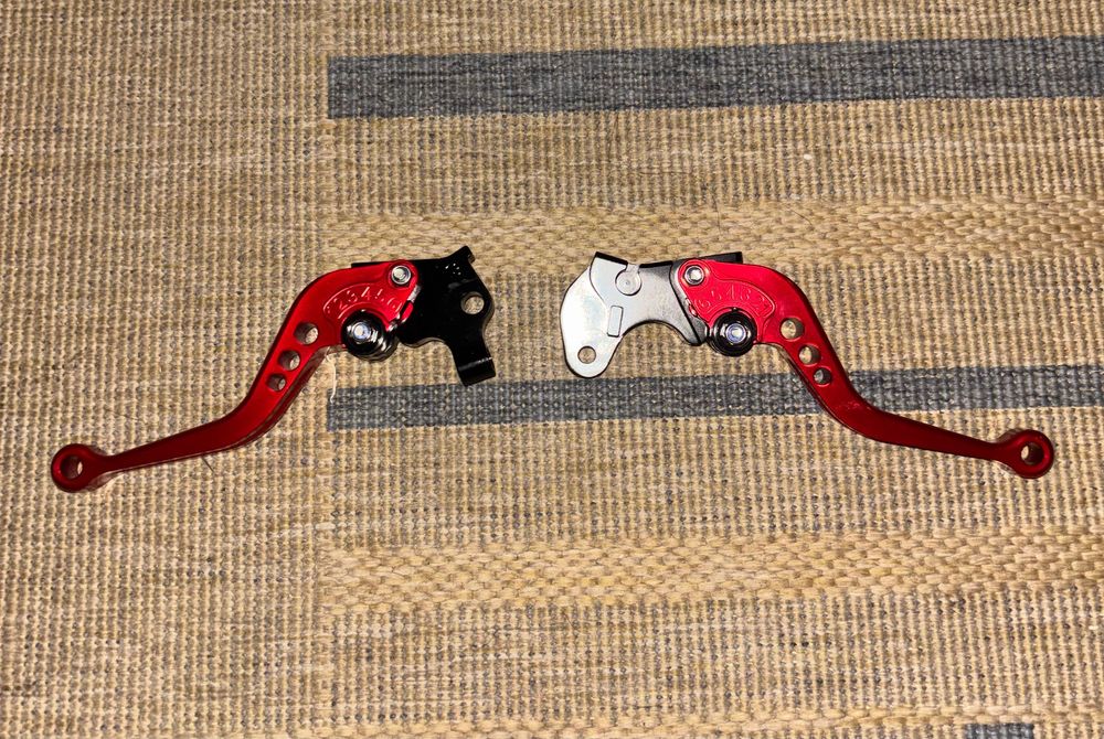 Par de manetes ajustáveis (travão + embraiagem) para Aprilia RS125