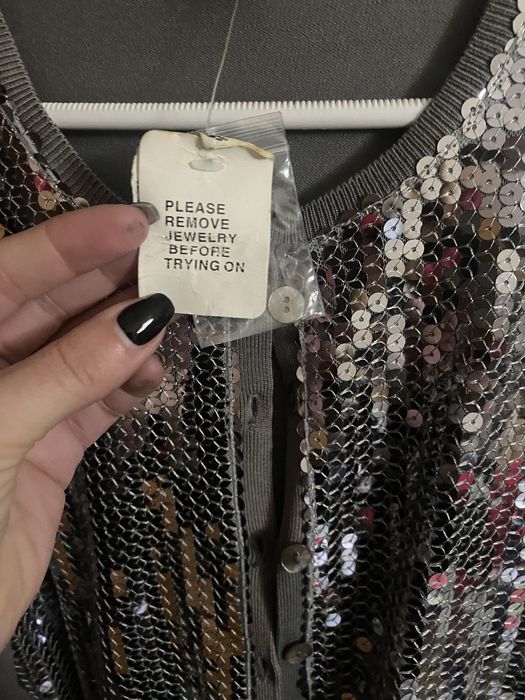 Casaco malha e lantejoulas