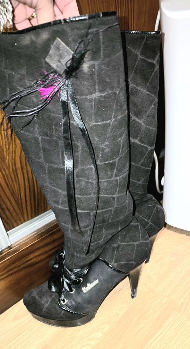 Botas de marca em pele