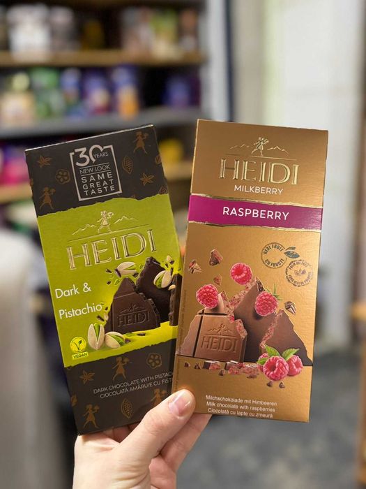 Шоколад Heidi молочний з малиною i чорний з фісташкою 80 г