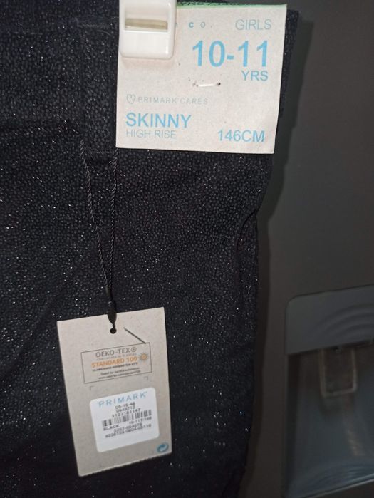 Calças pretas com brilho NOVAS 10/11 anos