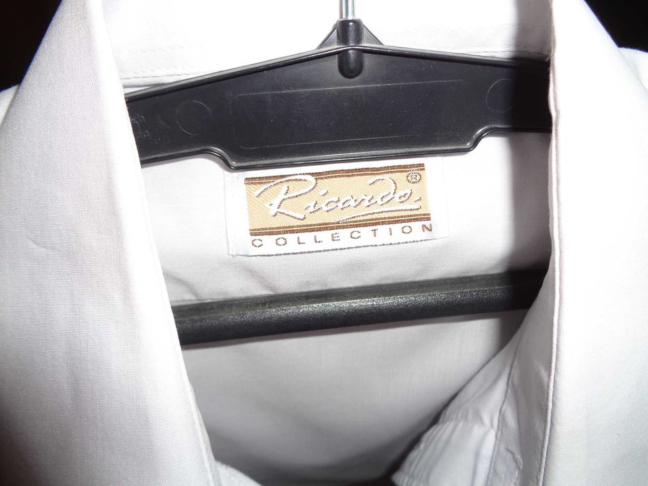 Koszula biała chłopięca.