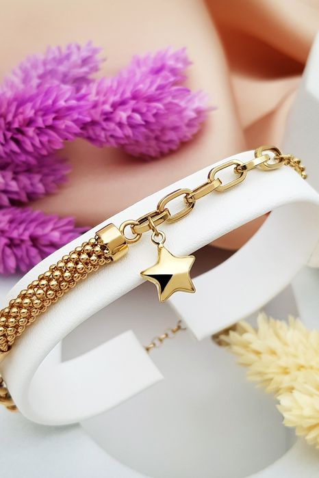 Złota bransoletka z zawieszką w kształcie gwiazdki
