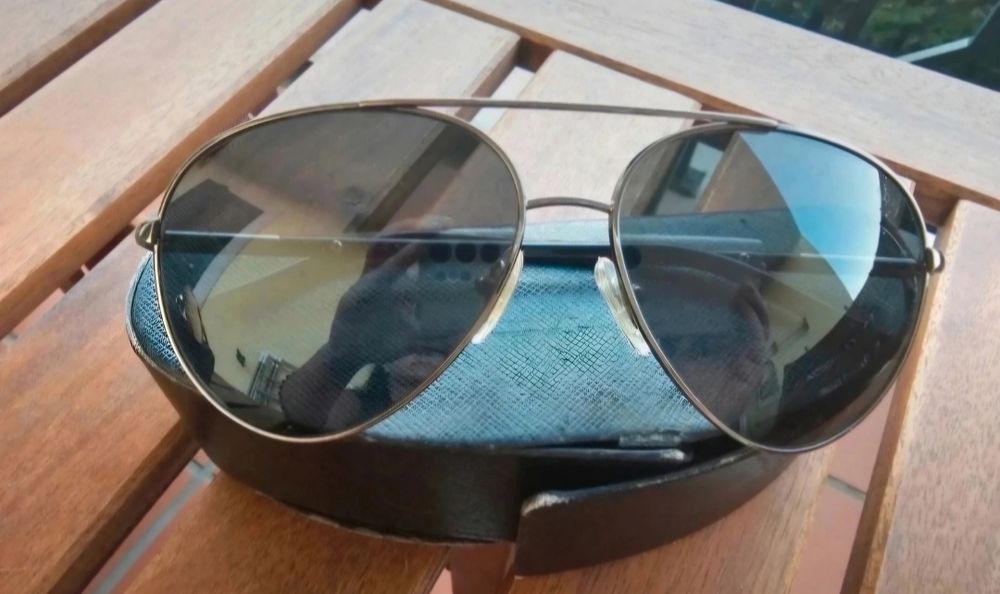 Óculos de sol Prada estilo aviador