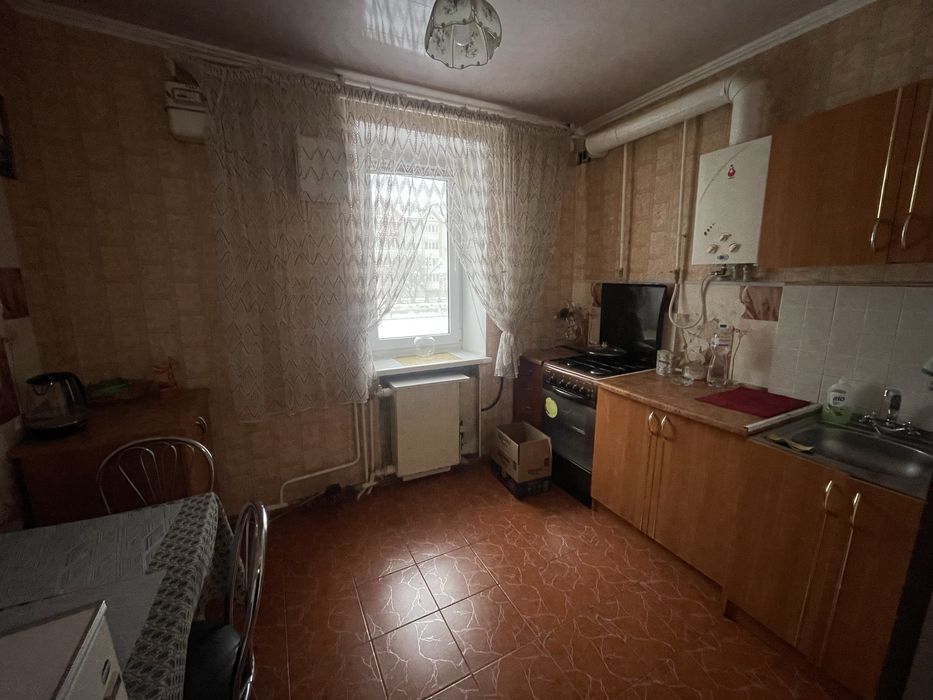 Квартира з індивідуальним опаленням в цегляному будинку