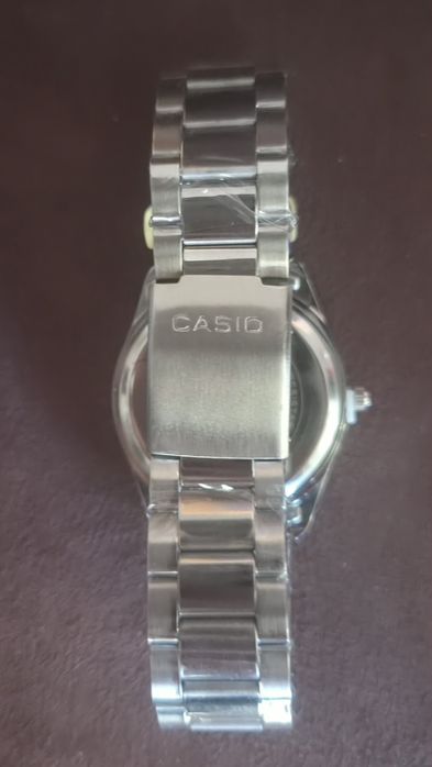 Relógio Casio MTP-1302 - cinza e branco
