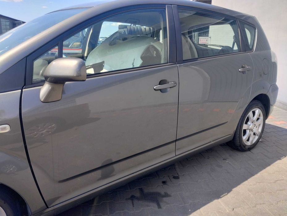 Drzwi lewy tył tylne  Toyota Corolla Verso II 01-04r 1C3 , części