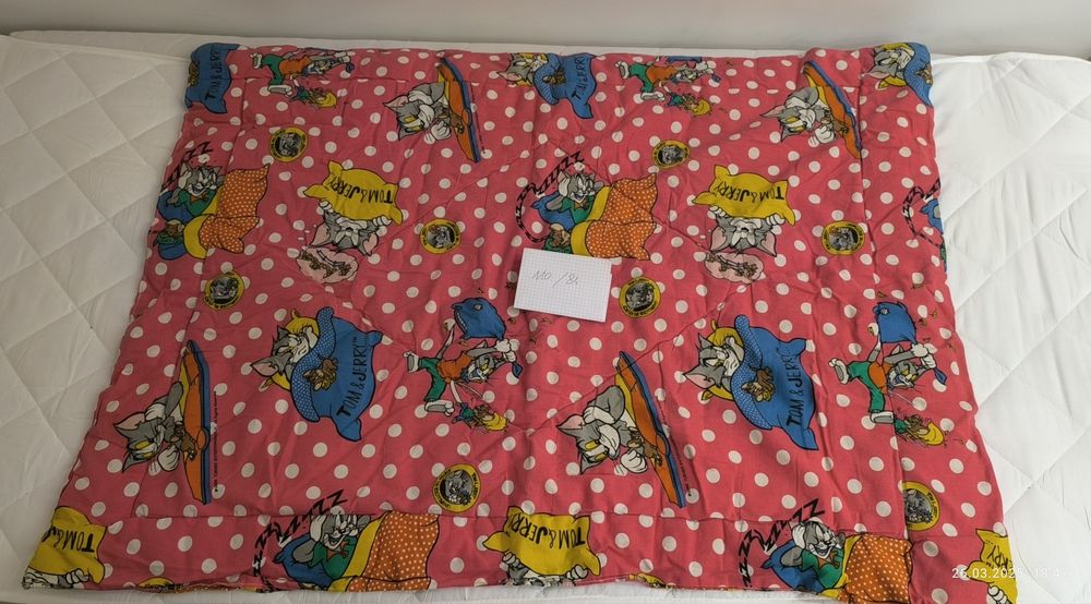 Kołderka na małe łóżeczko