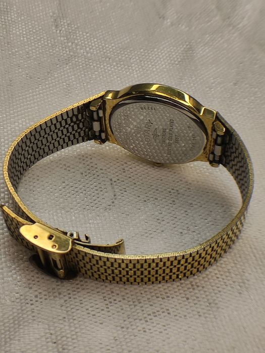 Rotary годинник наручний .позолота.