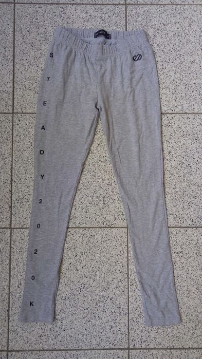 Calças e calções de menina 8-10 anos