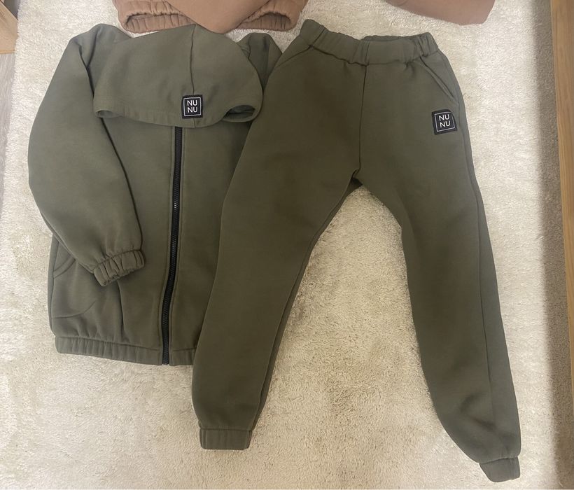 Dwa ocieplane dresy NuNu 128/134 stan idealny