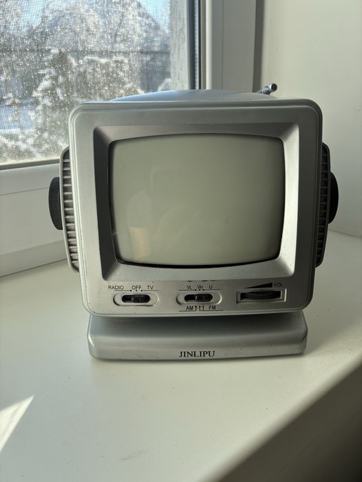 Переносной телевизор Jinlipu 1404B