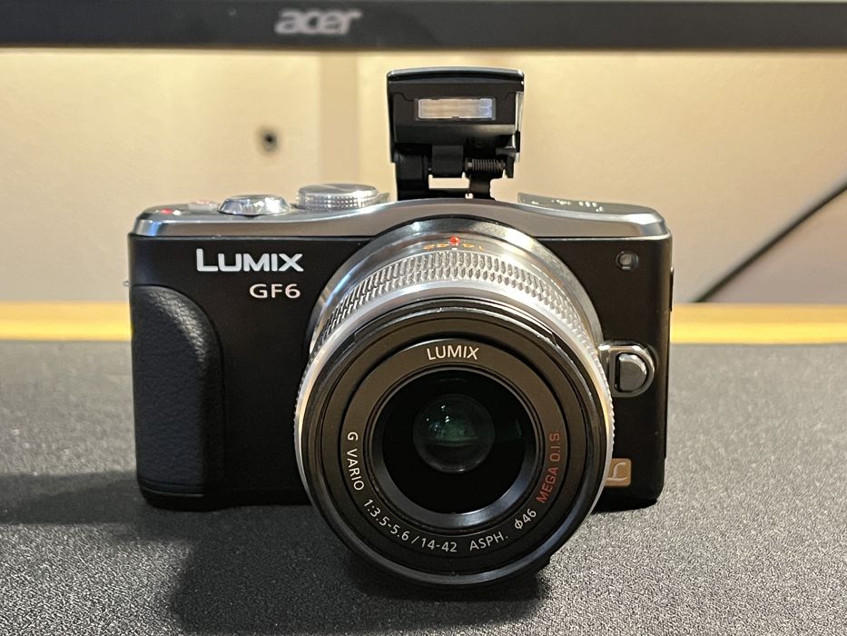 Lumix GF6+ obietyw 14-42 + pasek, bateria ,ładow. pudełko, stan BDB