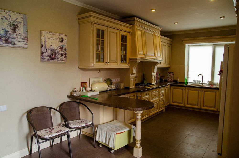 Будинок  з гаражем в м.Охтирка