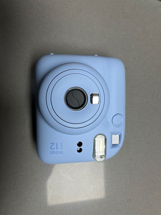 Máquina fotográfica Instax Mini 12 Mini nova, nunca usada.